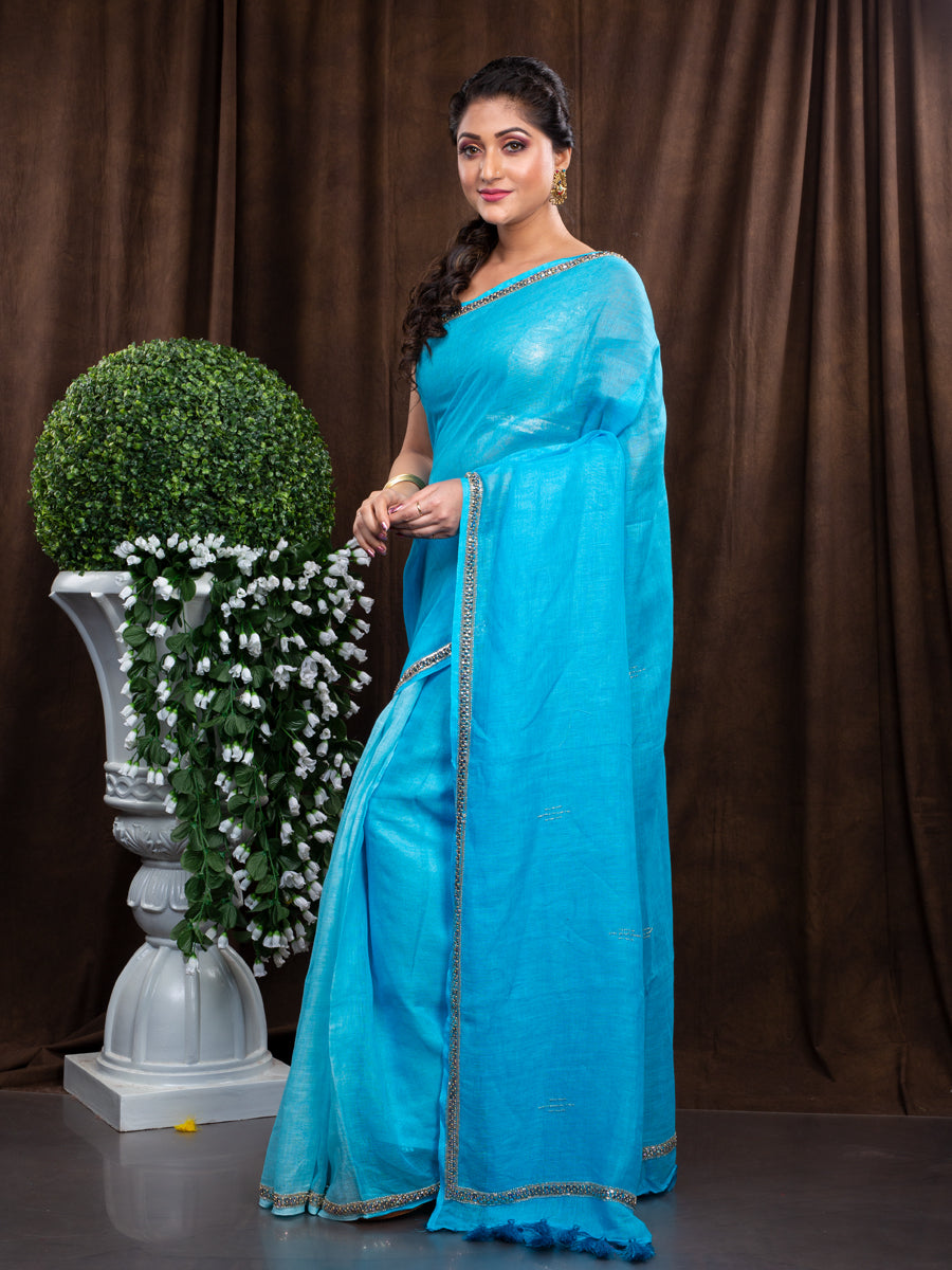 ELEVATE YOUR WARDROBE WITH THIS AQUA BLUE LINEN SAREE