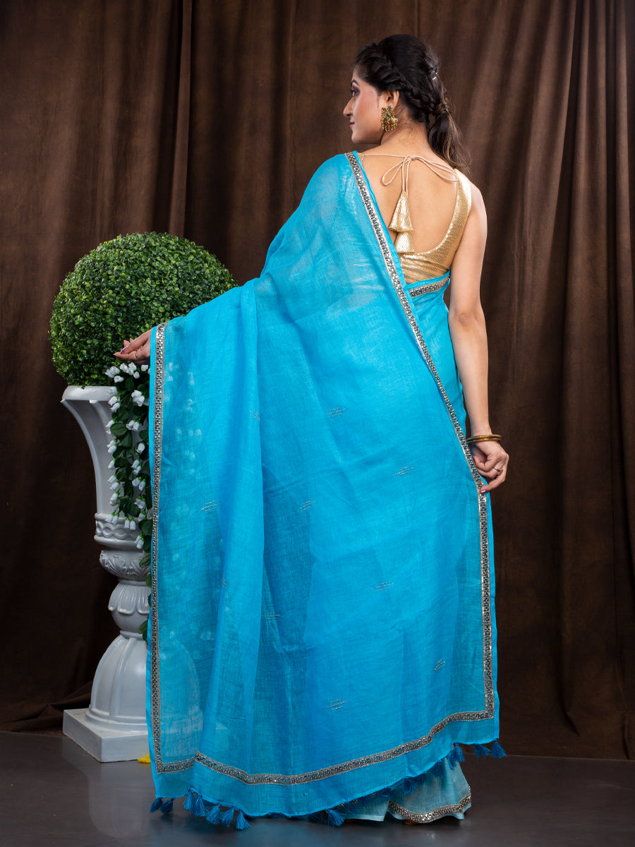 ELEVATE YOUR WARDROBE WITH THIS AQUA BLUE LINEN SAREE
