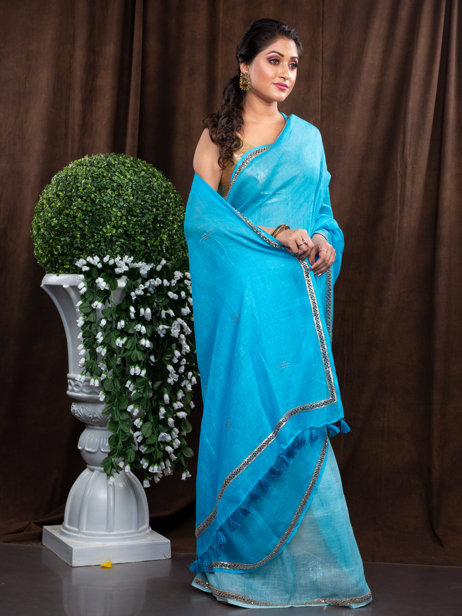 ELEVATE YOUR WARDROBE WITH THIS AQUA BLUE LINEN SAREE